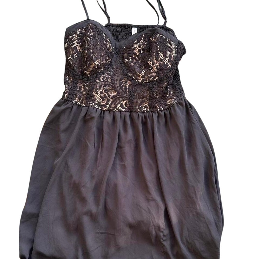 Black lace babydoll dress with adjustable straps‎ and a flowy skirt. Size: L